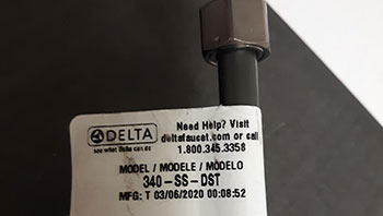 Photo showing tag displaying model number