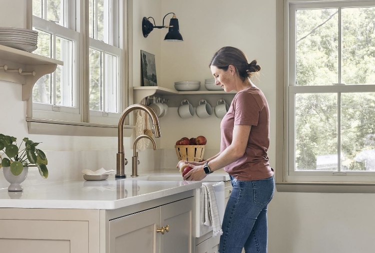 @oakdesignproject's rinsing produce under champagne bronze faucet