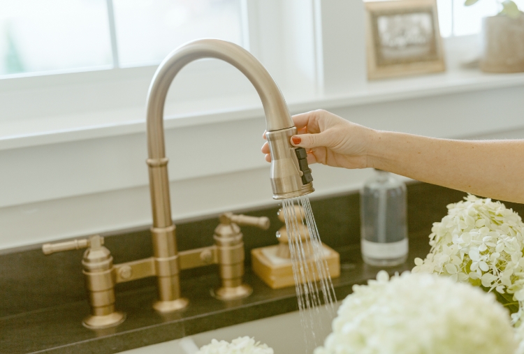 rinsing flowers with sink faucet