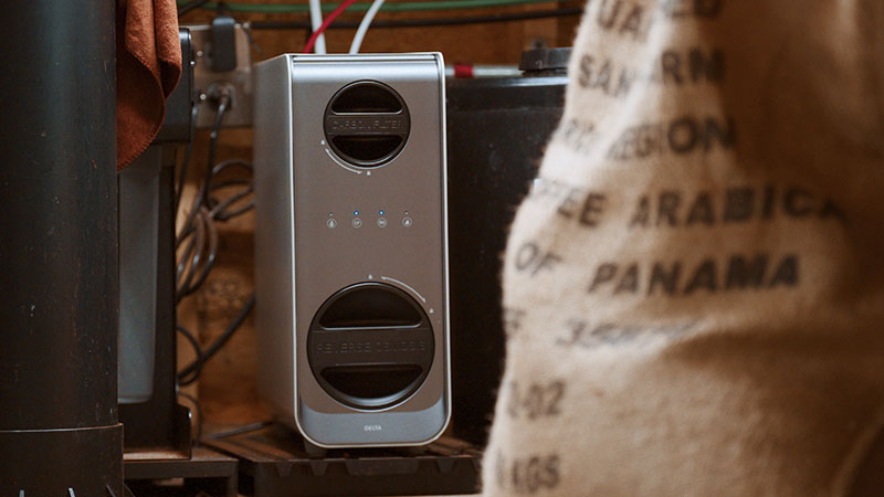 A computer tower with a bag of coffee beans